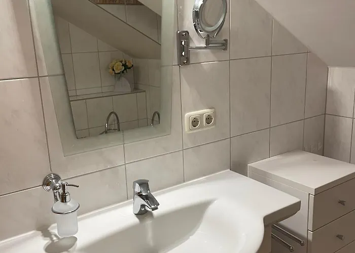 99 7, Ginsterweg 6 E Apartmán *