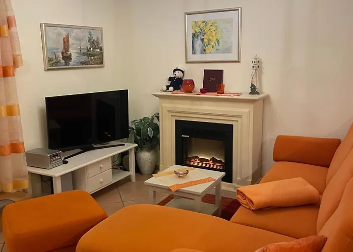 99 7, Ginsterweg 6 E Apartmán *