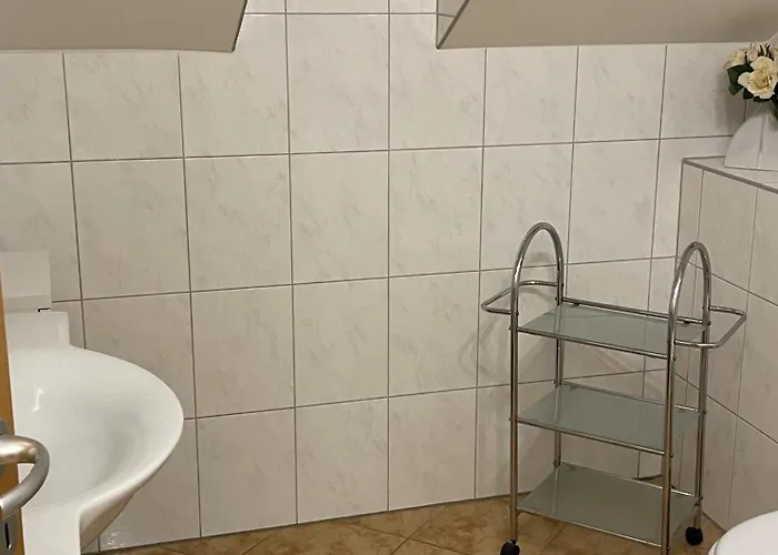 99 7, Ginsterweg 6 E Apartmán *